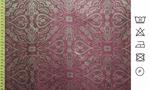 Jacquard rojo con motivos ornamentales en color dorado.