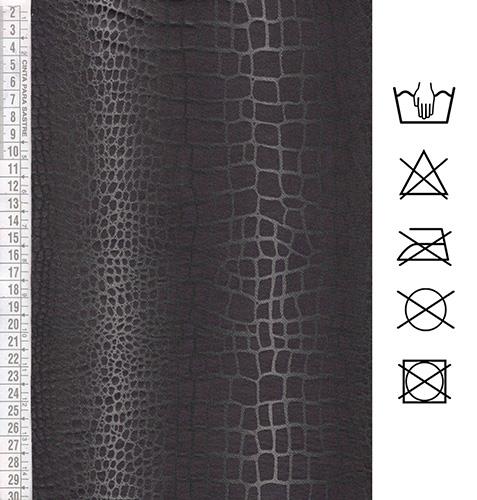 Tejido elástico estampado imitando piel de repti en negro y plata