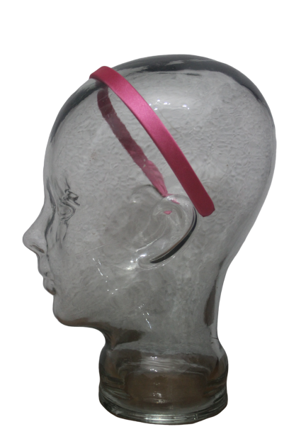 Diadema  o pasada forrada de raso color rosa fucsia.