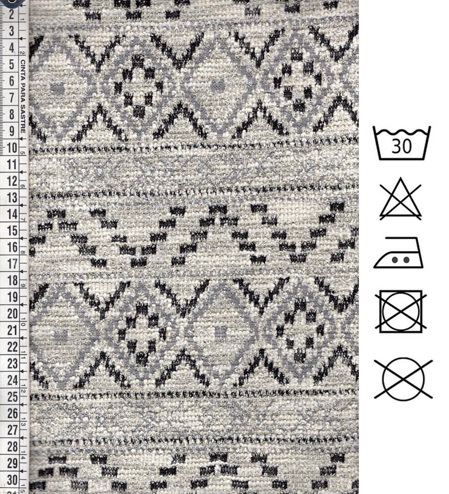 Jacquard Chanel crudo, gris, negro y oro con motivos étnicos