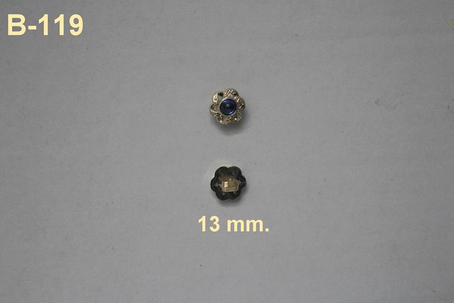 Botón dorado con forma de lazo y cristal zafiro central