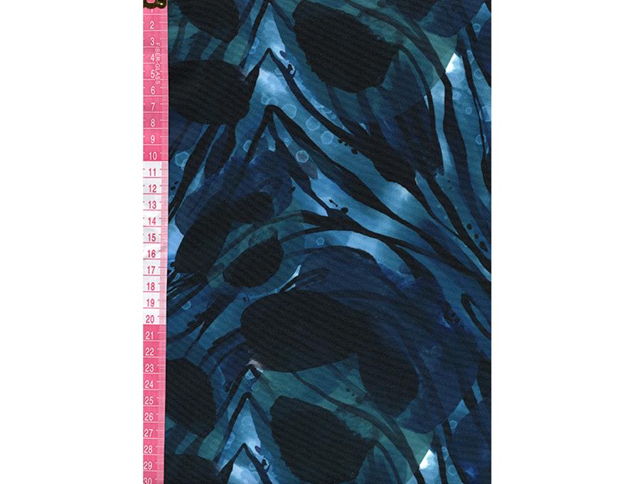 Tejido techno peach con estampado abstracto en tonos de azul