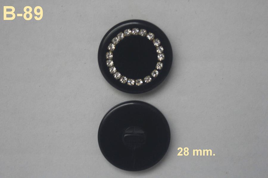 Botón joya Chanel negro con cristales strass