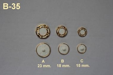 Botón blanco con filigrana dorada  | B35 | Tejidos, telas, complementos, tocados,sombrerería, plumas, tiras, encajes, bordados, botones, moda.